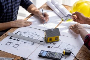 Home 13 Engineer Teamwork Meeting, Architect contractor meetings of real estate brokers and company presidents to select a model to build a housing estate in writing and presenting to state organizations.