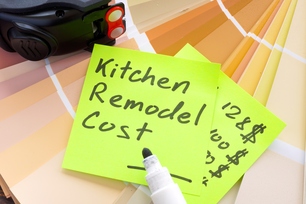 What a Kitchen Remodel Really Costs in 2026 1 Kitchen remodel cost sign with calculations on the piece of paper.